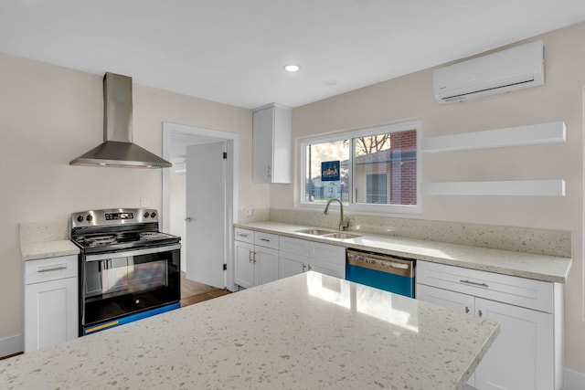 506 W Terrace Ave, Fresno, CA 93705 - kitchen featuring range with electric stovetop, wall chimney exhaust hood, a sink, dishwashing machine, and an AC wall unit
