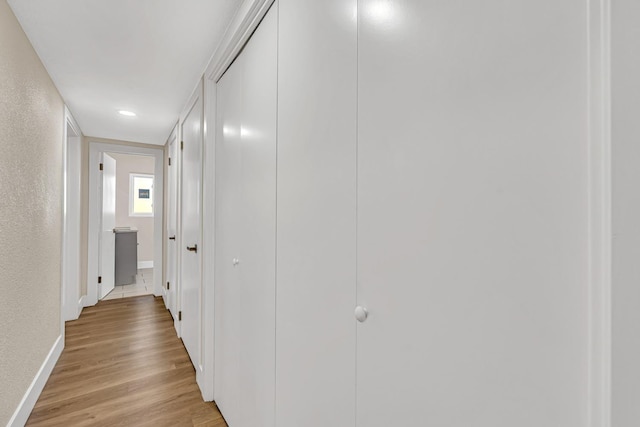 506 W Terrace Ave, Fresno, CA 93705 - corridor featuring light wood-type flooring, baseboards, and recessed lighting