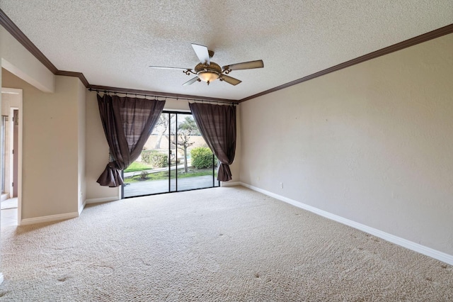 spare room with crown molding, baseboards, and light colored carpet