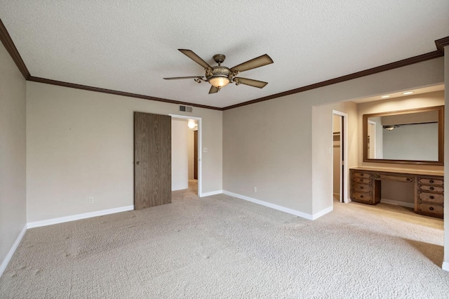 unfurnished bedroom featuring baseboards, visible vents, and a textured ceiling