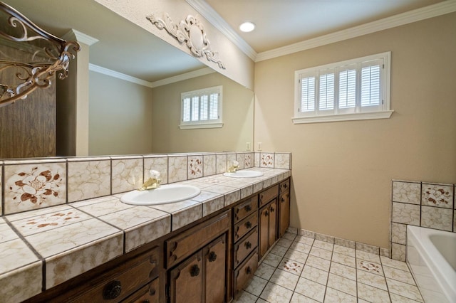 bathroom with double vanity, ornamental molding, a sink, and a tub