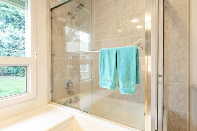 full bathroom featuring enclosed tub / shower combo