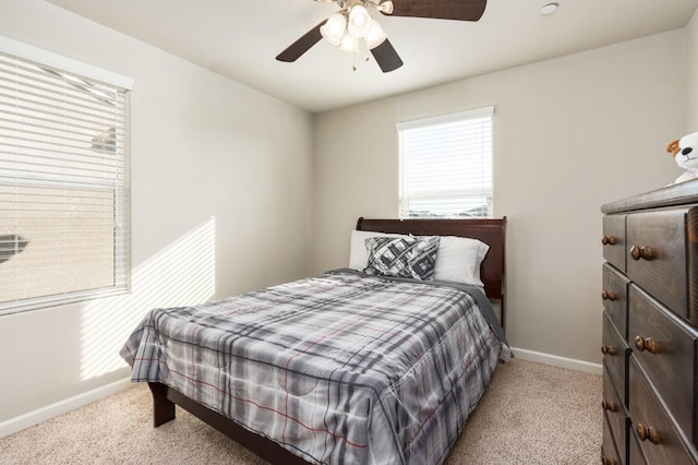 3384 Amanecer Ave, Clovis, CA 93619 - bedroom with multiple windows, carpet flooring, and baseboards