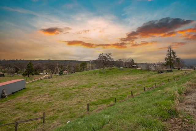 exterior space with a rural view