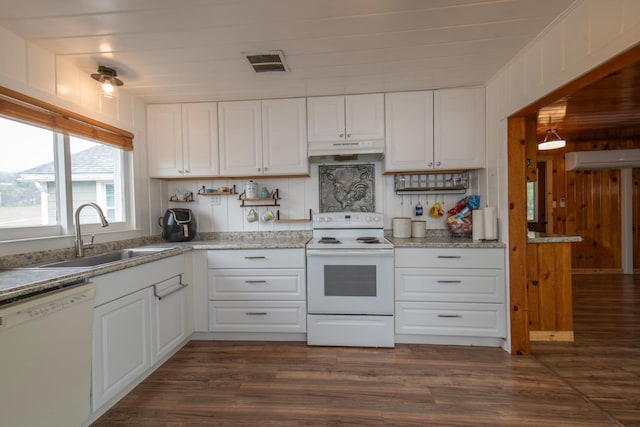 kitchen featuring visible vents, white cabinetry, a sink, white appliances, and under cabinet range hood