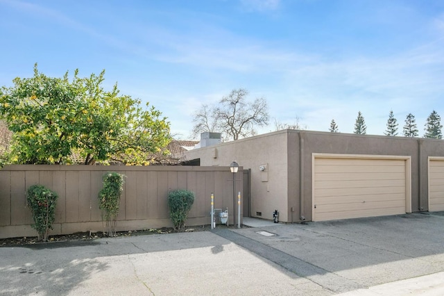 garage with fence