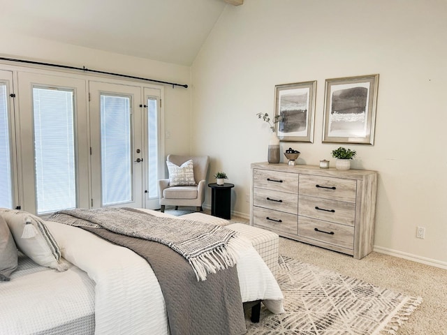 bedroom with lofted ceiling, access to outside, baseboards, and light colored carpet