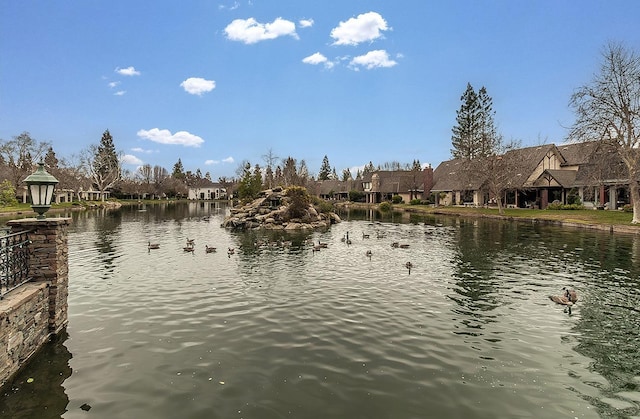 property view of water featuring a residential view