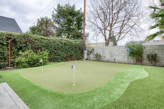 view of community featuring a fenced backyard