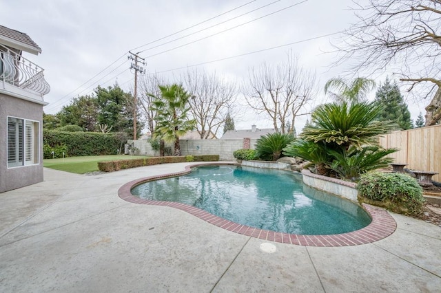 view of swimming pool with a fenced in pool, a patio area, and a fenced backyard