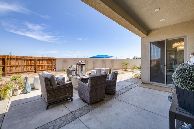6375 E Millie Dr, Fresno, CA 93727 - fenced backyard with a patio
