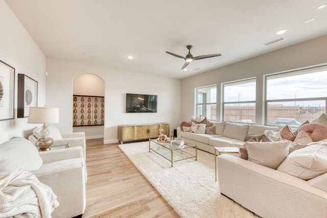 6375 E Millie Dr, Fresno, CA 93727 - living area with light wood-style flooring, ceiling fan, recessed lighting, and baseboards