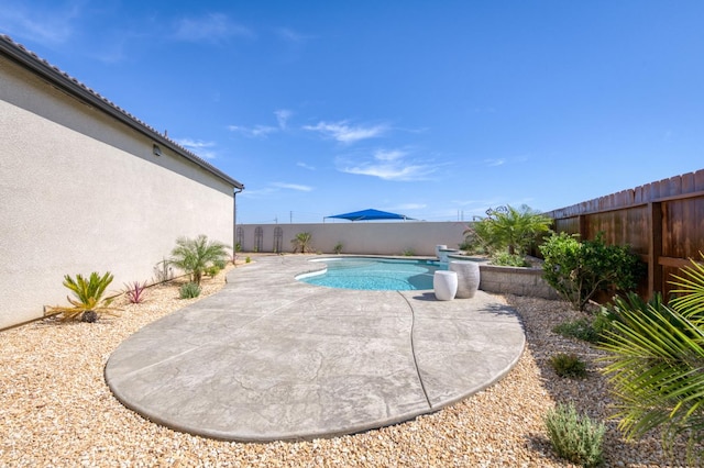 6375 E Millie Dr, Fresno, CA 93727 - view of pool with a fenced backyard and a patio