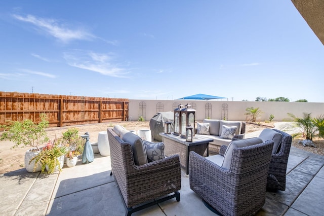 6375 E Millie Dr, Fresno, CA 93727 - fenced backyard featuring outdoor lounge area and a patio area