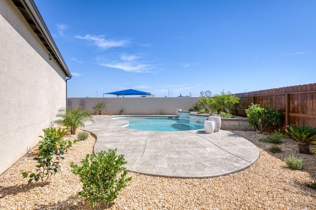 6375 E Millie Dr, Fresno, CA 93727 - view of swimming pool with a fenced backyard and a patio area