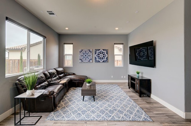1048 Sawtooth Way S, Madera, CA 93636 - living room with baseboards, wood finished floors, and recessed lighting