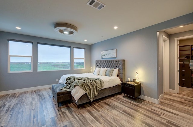 1048 Sawtooth Way S, Madera, CA 93636 - bedroom featuring light wood-style floors, baseboards, and recessed lighting