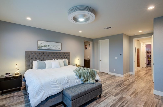 1048 Sawtooth Way S, Madera, CA 93636 - bedroom with light wood-style flooring, baseboards, and recessed lighting