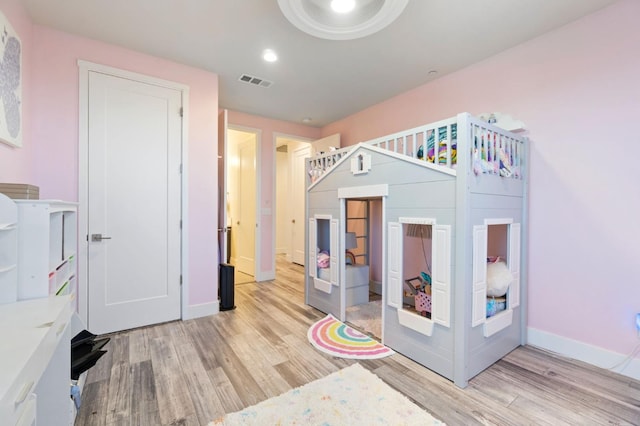 1048 Sawtooth Way S, Madera, CA 93636 - bedroom with light wood-type flooring, baseboards, and recessed lighting