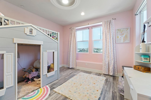 1048 Sawtooth Way S, Madera, CA 93636 - bedroom with wood finished floors, a closet, baseboards, and recessed lighting