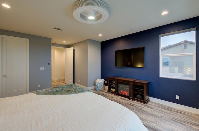1048 Sawtooth Way S, Madera, CA 93636 - bedroom featuring wood finished floors, baseboards, and recessed lighting