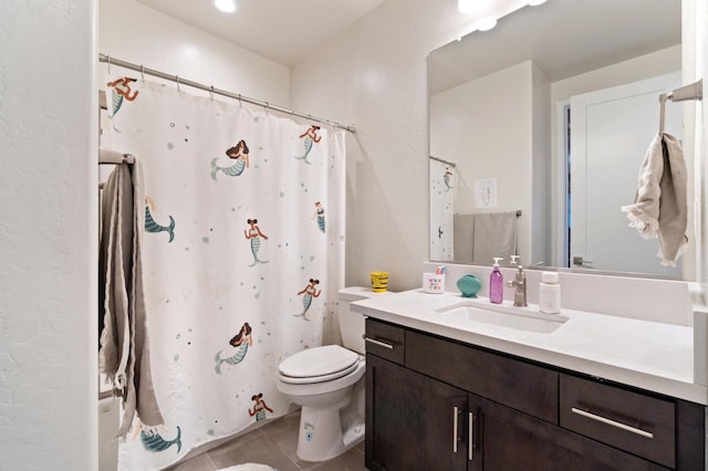 1048 Sawtooth Way S, Madera, CA 93636 - bathroom featuring tile patterned floors, toilet, vanity, and curtained shower