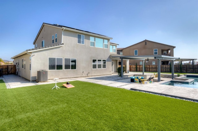 1048 Sawtooth Way S, Madera, CA 93636 - back of house featuring a patio area, stucco siding, central AC, and a pool with connected hot tub