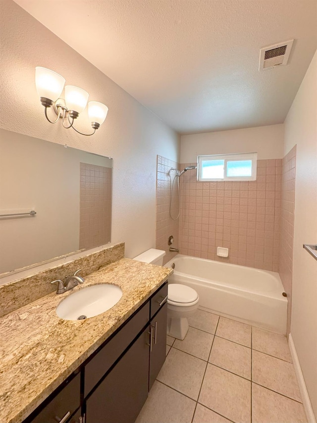 full bath featuring toilet, visible vents, a textured ceiling, and tile patterned floors