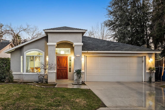 ranch-style house featuring roof with shingles, stucco siding, concrete driveway, an attached garage, and a front yard