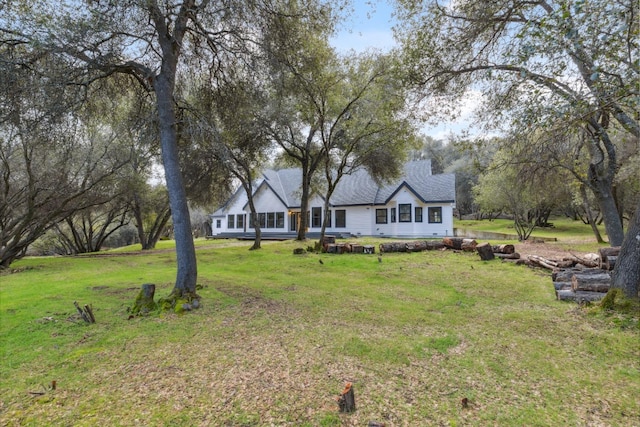 view of front of home with a front lawn