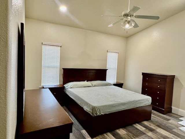 bedroom with light wood-style flooring and ceiling fan