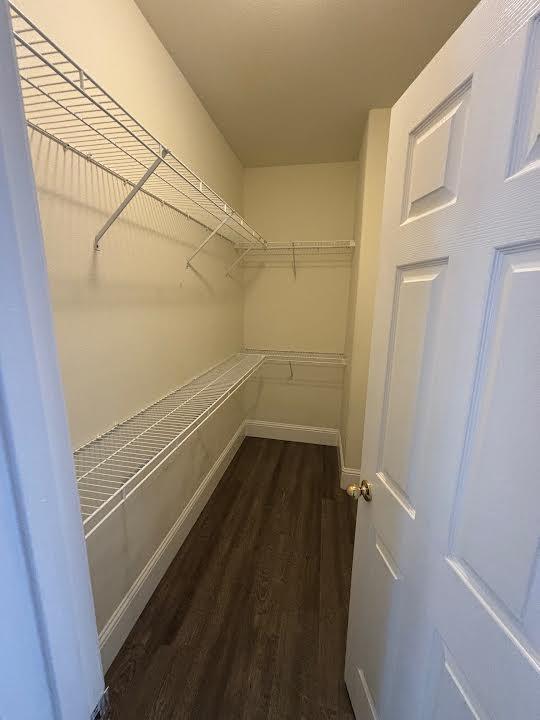 2136 Florence Ave, Sanger, CA 93657 - walk in closet with wood finished floors