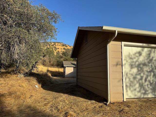 view of home's exterior featuring a mountain view