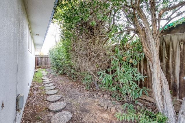 view of yard with fence