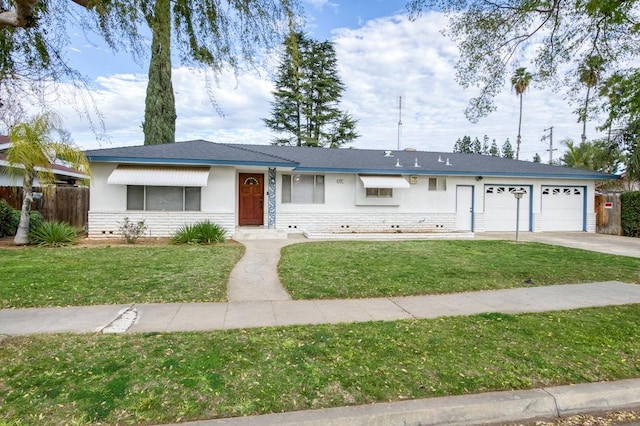 single story home with an attached garage, fence, concrete driveway, stucco siding, and a front lawn