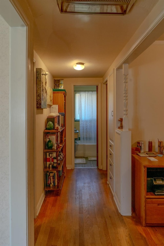 corridor featuring light wood-type flooring