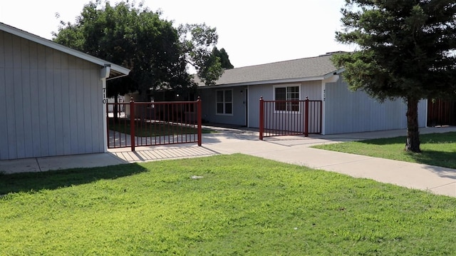 view of yard with a gate