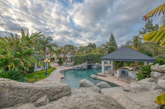 pool featuring a patio area and a gazebo