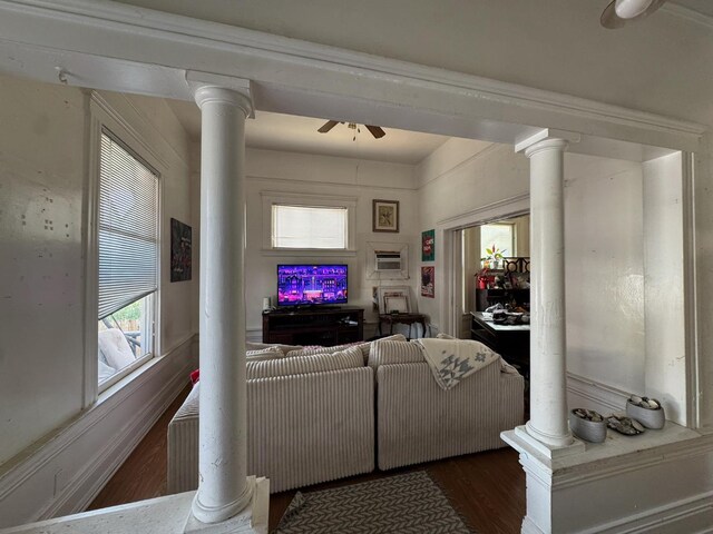 385 N San Pablo Ave, Fresno, CA 93701 - living area with ornate columns, wood finished floors, and a ceiling fan