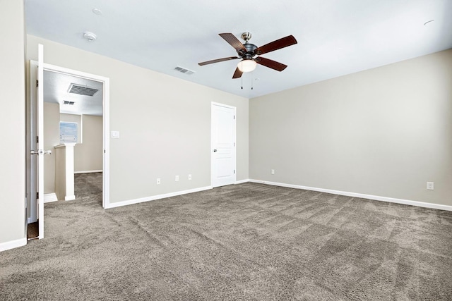 unfurnished bedroom featuring carpet, visible vents, ceiling fan, and baseboards