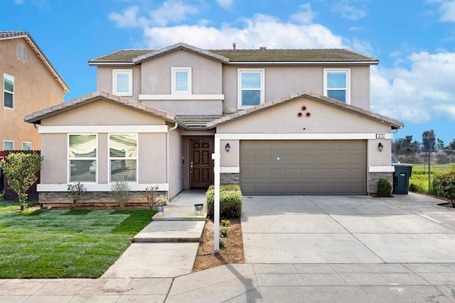 traditional home featuring stone siding, a tiled roof, concrete driveway, and stucco siding