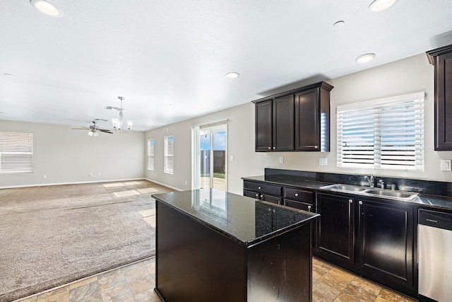 kitchen with light carpet, a sink, open floor plan, a center island, and dishwasher