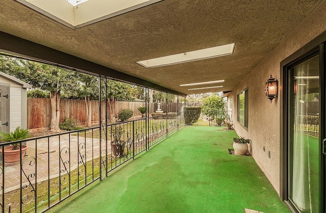 view of patio featuring fence