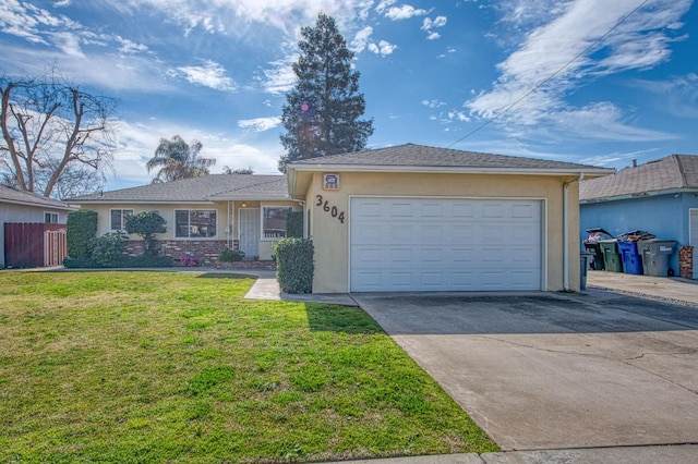 ranch-style home featuring driveway, a garage, a front lawn, and stucco siding