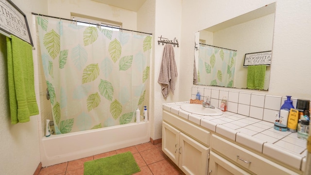 full bath with decorative backsplash, tile patterned floors, vanity, and shower / tub combo with curtain