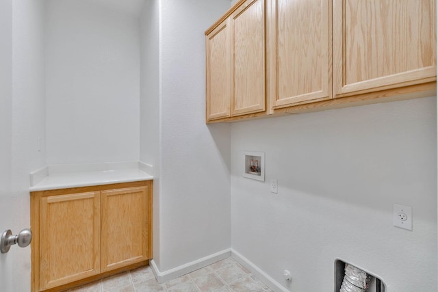 laundry room featuring hookup for a washing machine, hookup for a gas dryer, baseboards, cabinet space, and electric dryer hookup