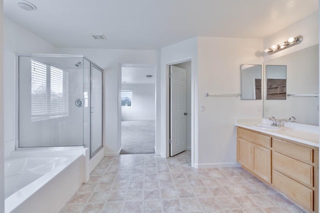 full bath with visible vents, a shower stall, vanity, and a bath