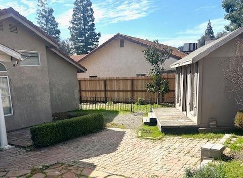 view of patio / terrace with fence