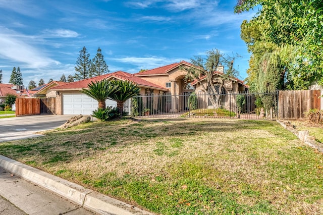 view of front of house featuring fence private yard, concrete driveway, an attached garage, and a front yard