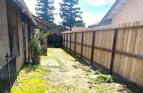 view of yard featuring a fenced backyard